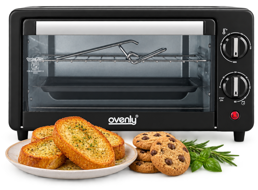 Ovenly 10L oven in Midnight Black with garlic bread and cookies